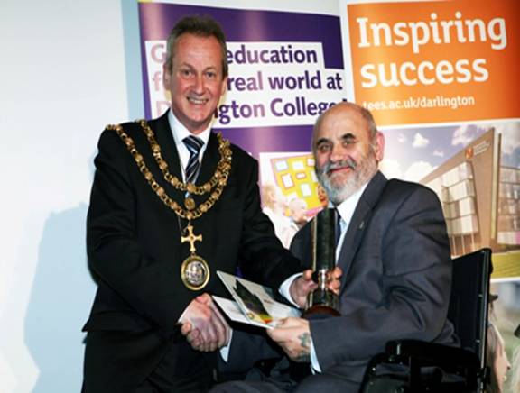 Photo showing Gordon Pybus receiving his Citizen of the Year Award from Mayor Councillor Brain Thistlethwaite