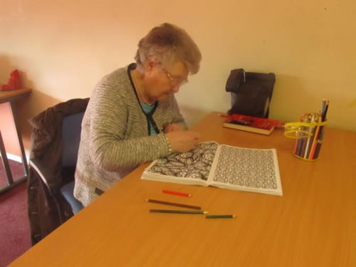 Photo showing Sheila accessing Art Therapy